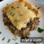 Swiss Mushroom Runza Bake 19 Square of Runza Casserole on a white plate