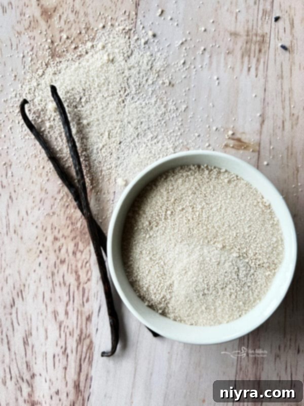 Vanilla-flavored sugar in a bowl with a spoon, ready to be used.
