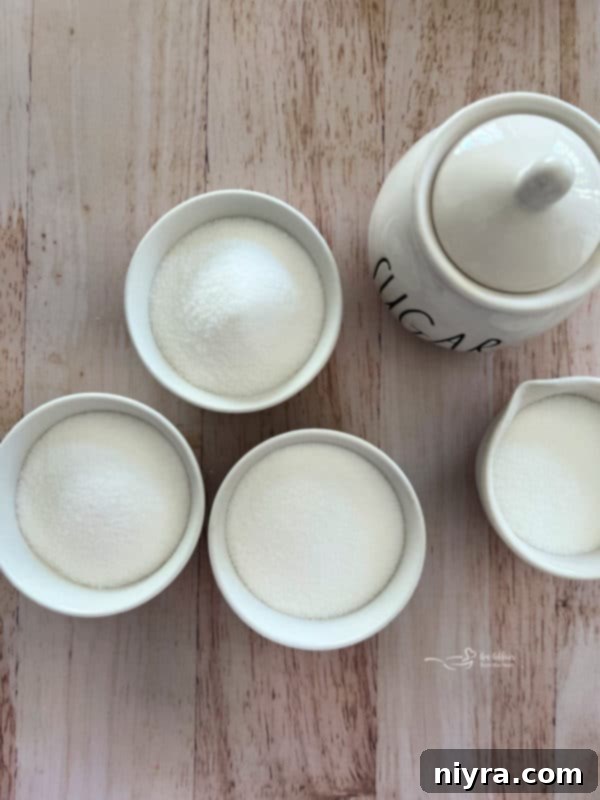 Another overhead shot showing a variety of extracts in bottles and tubes, suggesting different forms and concentrations of flavorings.