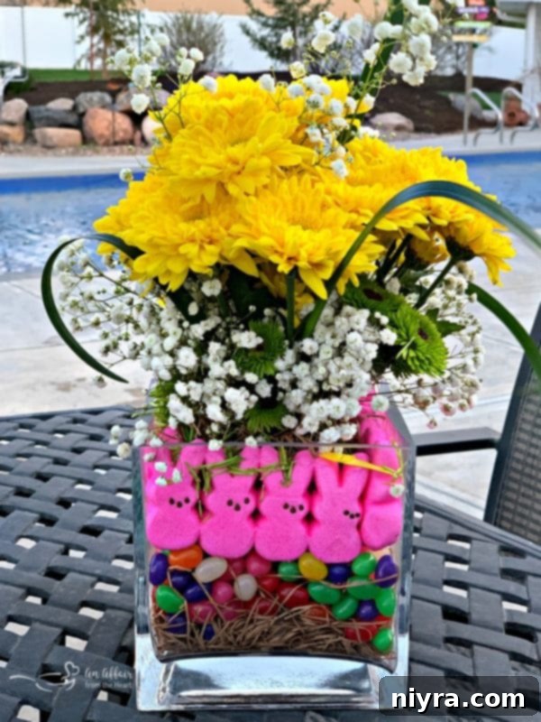 Close-up of a colorful Peep and jelly bean centerpiece with yellow flowers