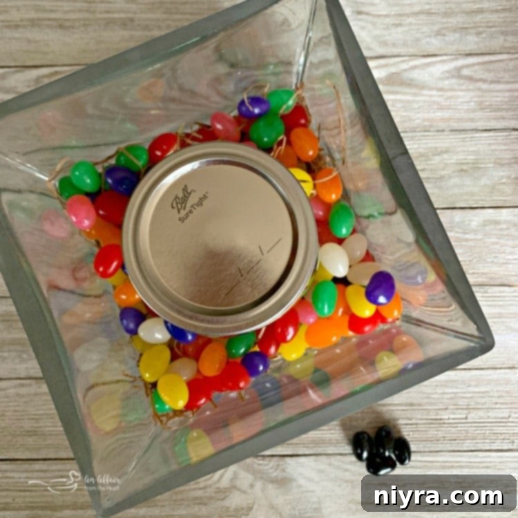 Arranging the mason jar in a clear vase for a Peep centerpiece