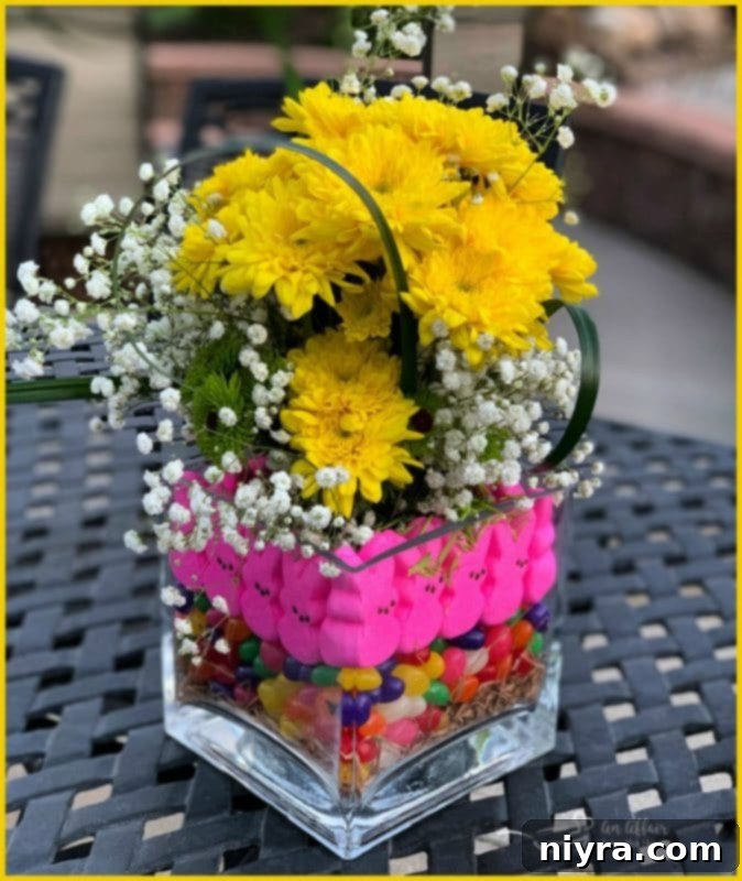 A finished Peep centerpiece with pink and yellow marshmallow bunnies