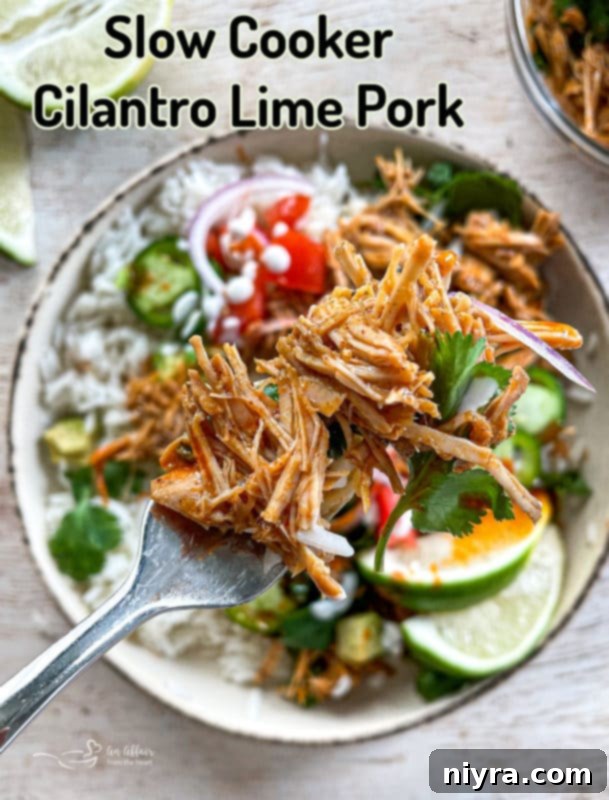 A stunning final shot of Slow Cooker Cilantro Lime Pork in a serving dish, ready to be devoured.