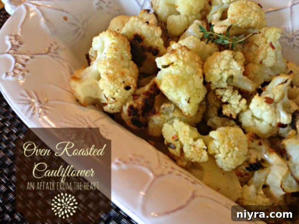 Crispy Roasted Cauliflower 8 Close-up of freshly roasted cauliflower florets in a serving dish, showing the browned edges and seasoning.