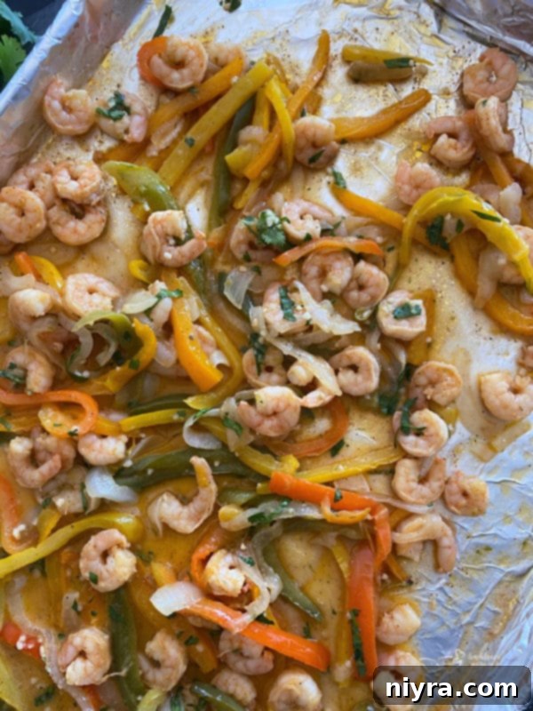One Pan Shrimp Fajitas with Zesty Cilantro Lime Butter 11 Cilantro Lime Shrimp Fajitas with a squeeze of lime