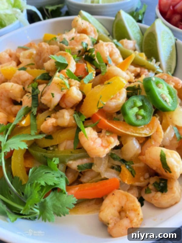 One Pan Shrimp Fajitas with Zesty Cilantro Lime Butter 12 Close-up of Cilantro Lime Shrimp Fajitas, ready to eat