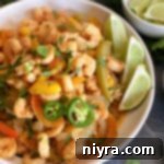 One Pan Shrimp Fajitas with Zesty Cilantro Lime Butter 17 Cilantro Lime Shrimp Sheet Pan Fajitas in a white serving bowl