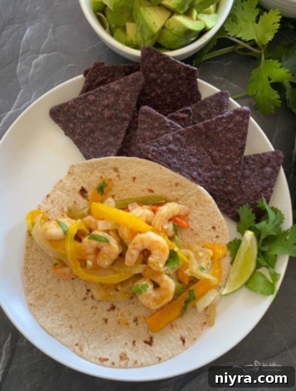 One Pan Shrimp Fajitas with Zesty Cilantro Lime Butter 3 Close-up of vibrant Sheet Pan Cilantro Lime Shrimp Fajitas
