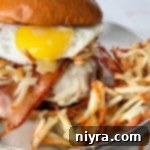 Hangover Burger plated with crispy shredded hashbrowns
