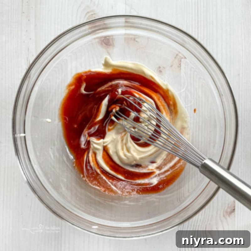 Ingredients for the homemade Hangover Burger sauce: ketchup, mayonnaise, and Sriracha