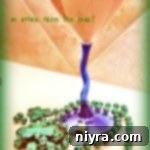 Bailey's Velvet Martini 2 Bailey's Irish Martini and green beads on a white counter