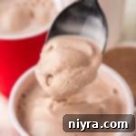 A spoon digging into a Copycat Wendy's Frosty.