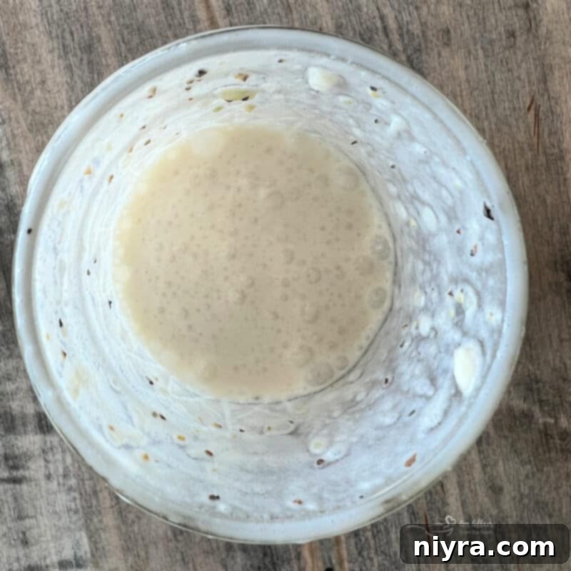 Shredded cabbage and carrots in a large mixing bowl