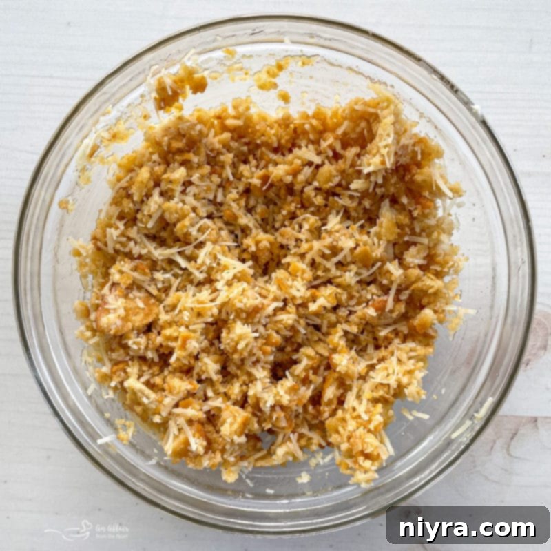 Baked Jalapeño Popper Dip 7 a bowl of crackers and butter