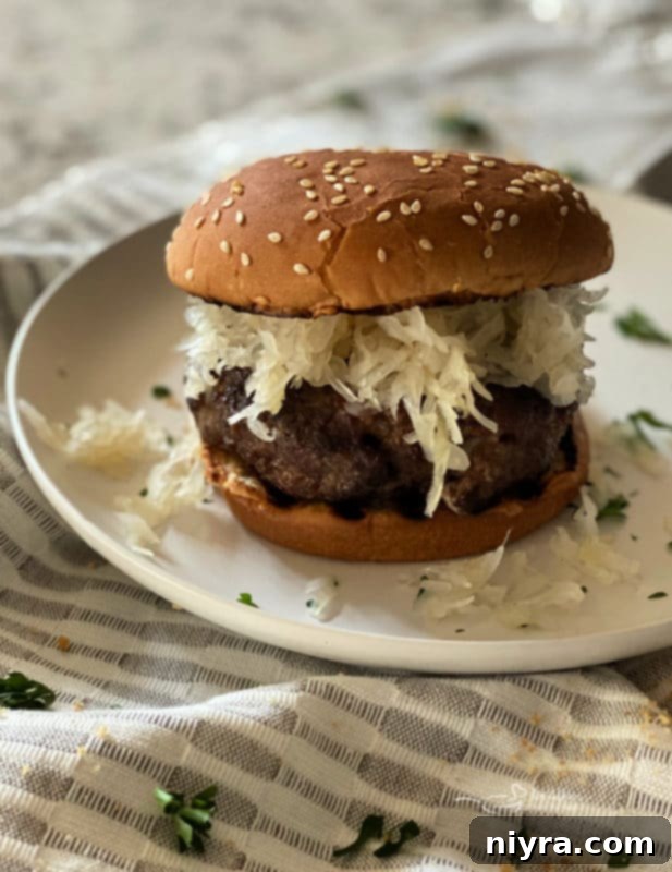 Finished Swiss Cheese Krautburger with toppings