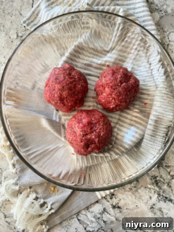 Ground beef mixture divided into portions