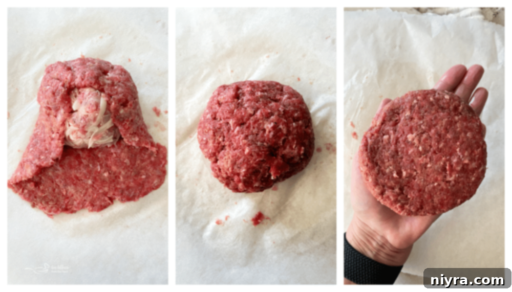 Closing a beef patty around a kraut and cheese meatball