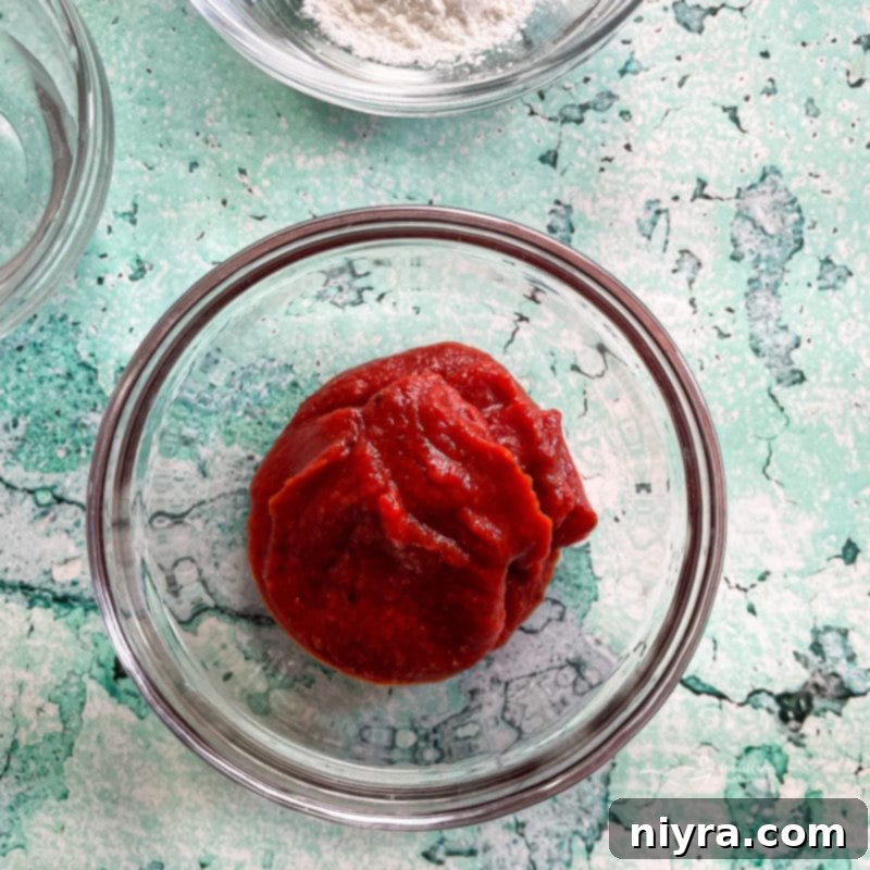 Various sauce ingredients in separate bowls