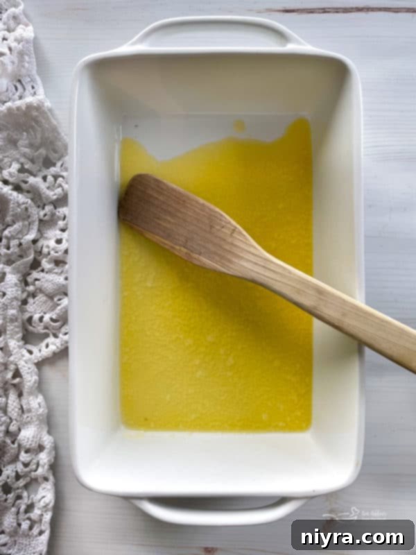 melted butter in baking dish