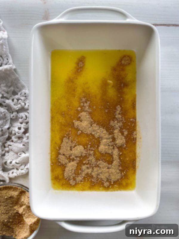 melted butter with graham cracker crumbs
