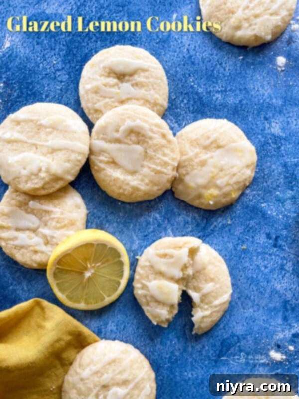 A large platter of freshly baked chewy glazed lemon cookies, a perfect dessert