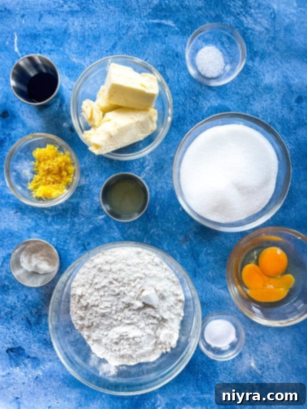 Freshly baked lemon cookies cooling on a wire rack before glazing
