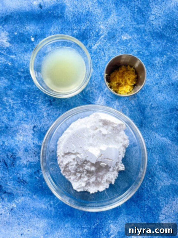 Ingredients for lemon glaze laid out: powdered sugar, lemon juice, lemon zest