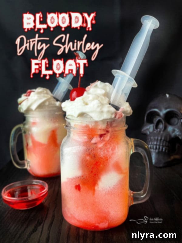 Dirty Shirley's Crimson Cloud 13 Bloody Dirty Shirley Float adult Halloween cocktail with syringe