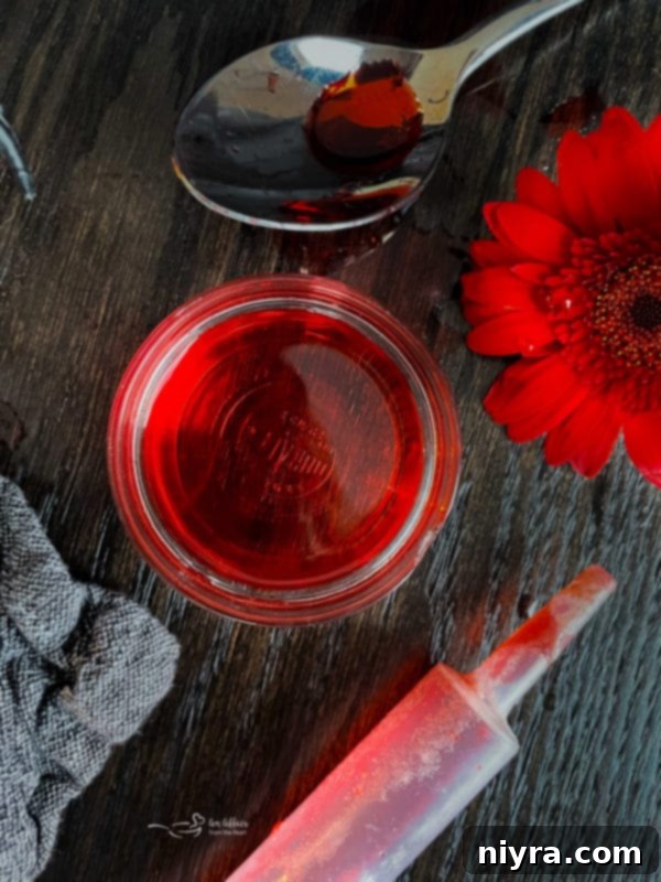 Dirty Shirley's Crimson Cloud 3 Close-up of Bloody Dirty Shirley Float with syringe