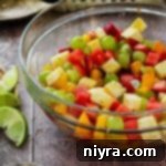 Margarita Fruit Salad in a clear bowl.