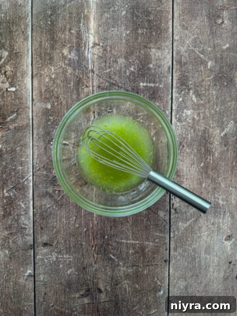 Whisking ingredients for Margarita Lime Dressing