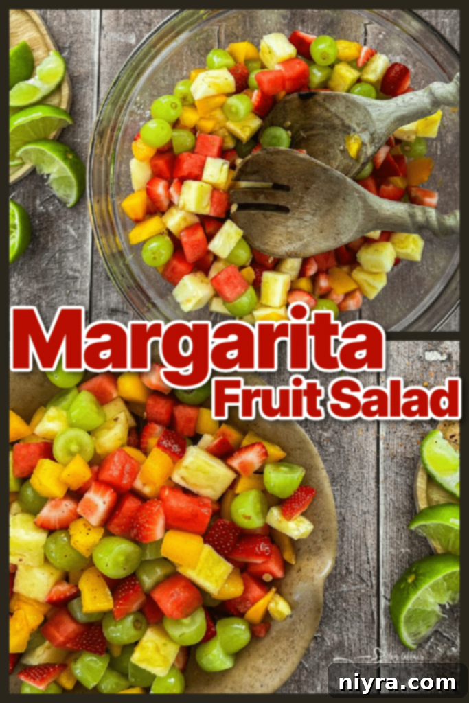 Bowl of Margarita Fruit Salad with a serving spoon