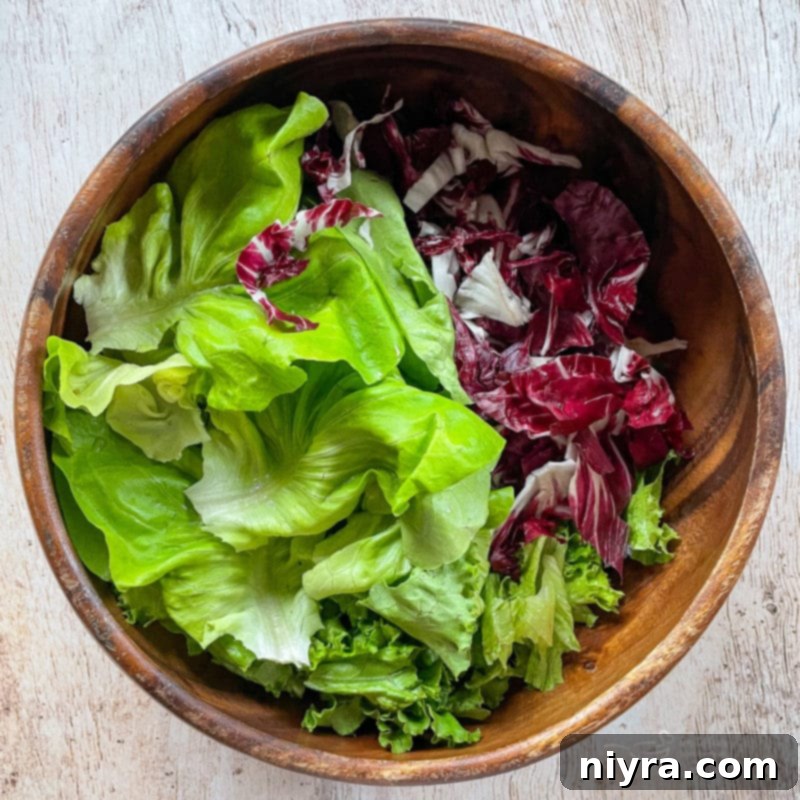 Waldorf Salad Brown bowl with mixed lettuce and radicchio