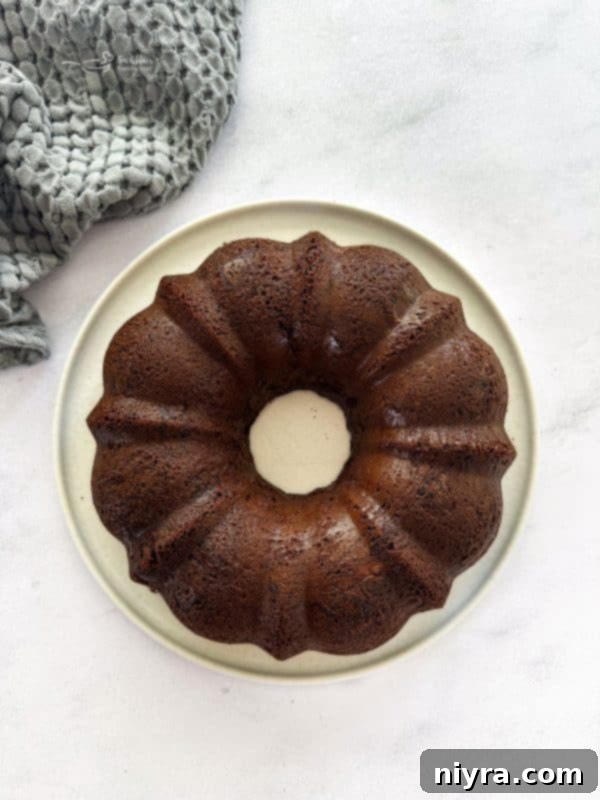 The perfectly baked Chocolate Espresso Bundt Cake, golden brown and ready to be cooled before glazing.