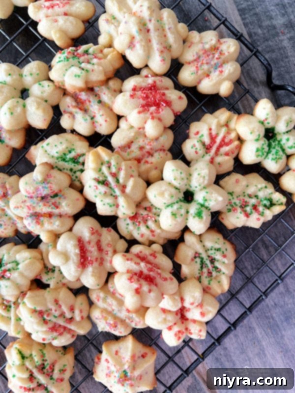 close view of spritz cookie on wire rack
