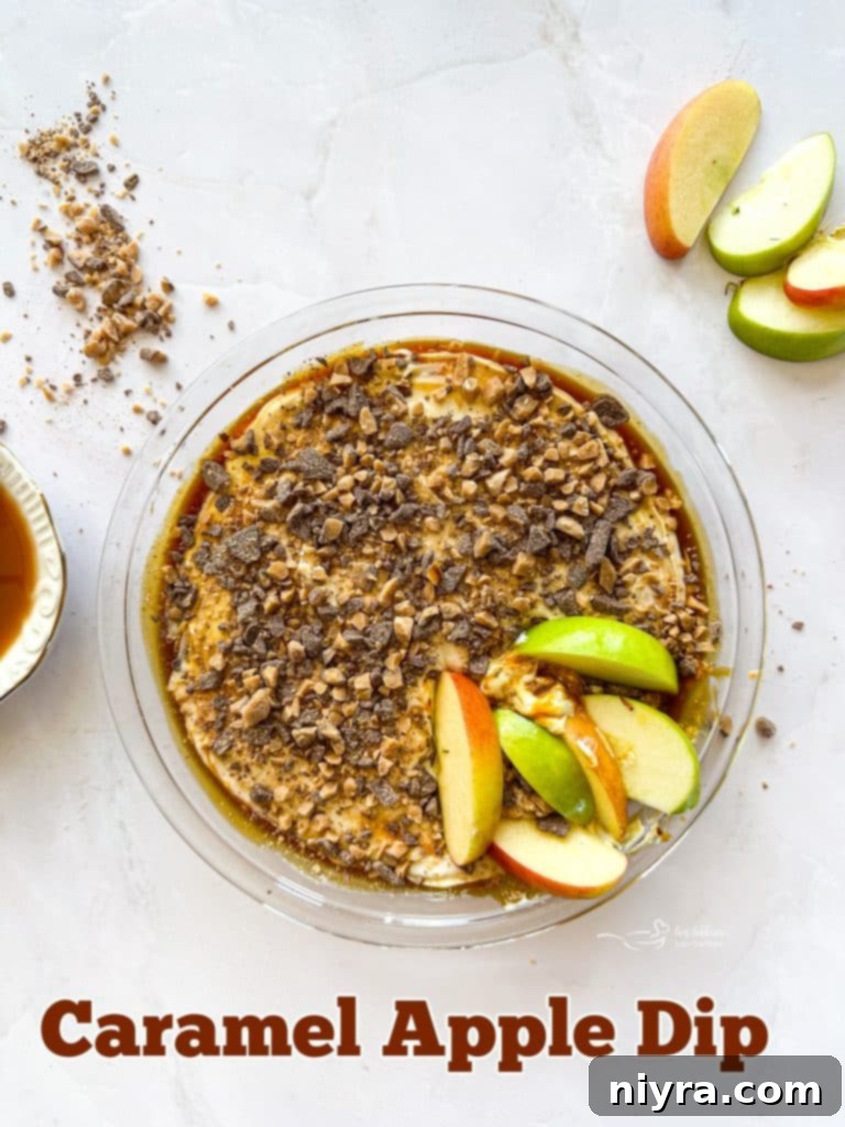 Close-up of Caramel Apple Dip with spoon and apple slices