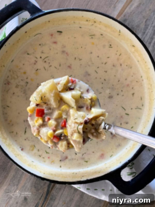 A beautifully presented bowl of Cheesy Potato Corn Chowder