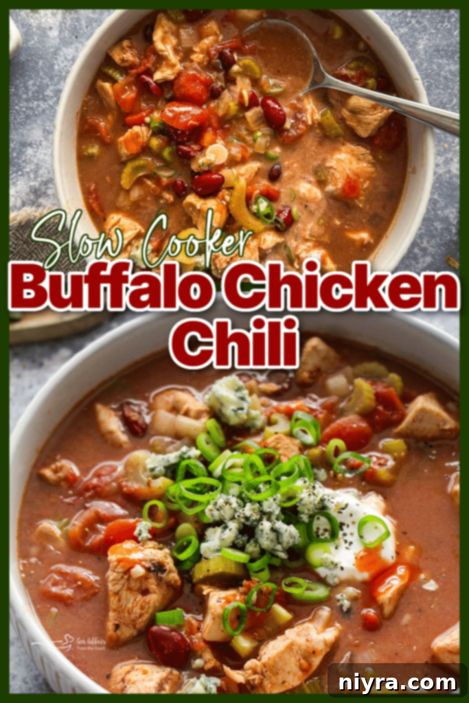 A close-up of a rustic wooden spoon scooping into the hearty Slow Cooker Buffalo Chicken Chili, showcasing its rich texture.