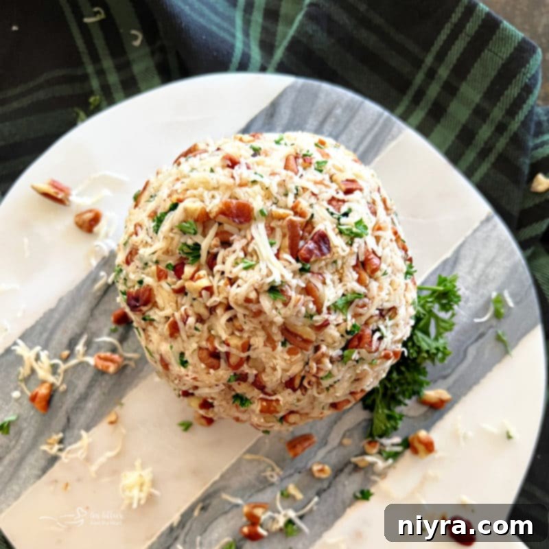 Dorothy's Holiday Cheese Ball served with crackers