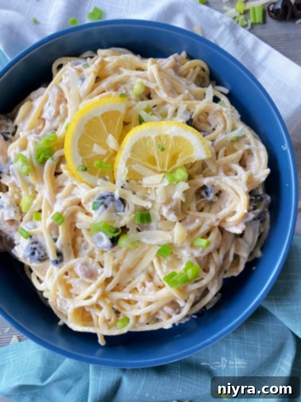 top view of spaghetti with tuna and lemon