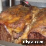 Finished prime rib in a roasting pan