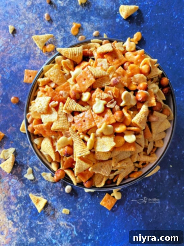 Irresistible Candy Coated Crispix Treat 5 Touchdown Snack Mix in a football-themed bowl
