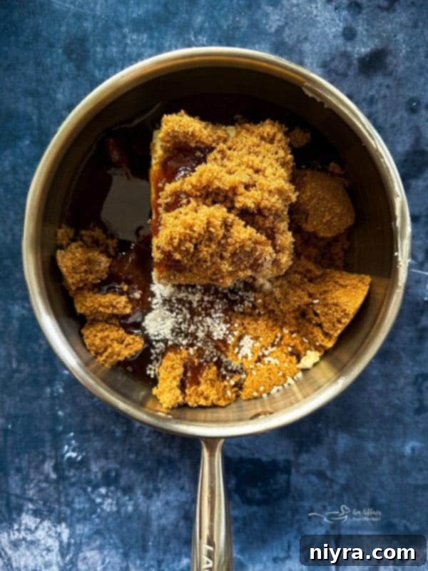 Irresistible Candy Coated Crispix Treat 10 Saucepan with butter, brown sugar, corn syrup, and salt melting