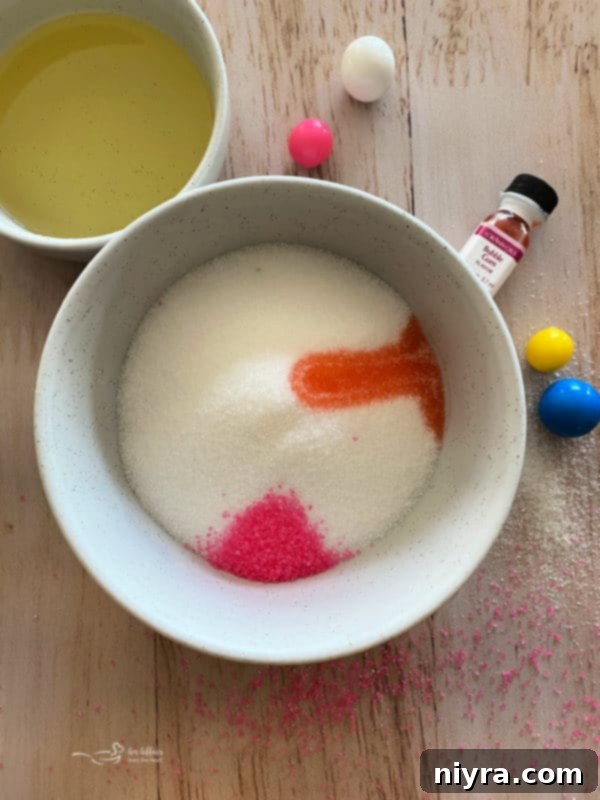 Close-up of bubblegum sugar scrub with pink sugar crystals.