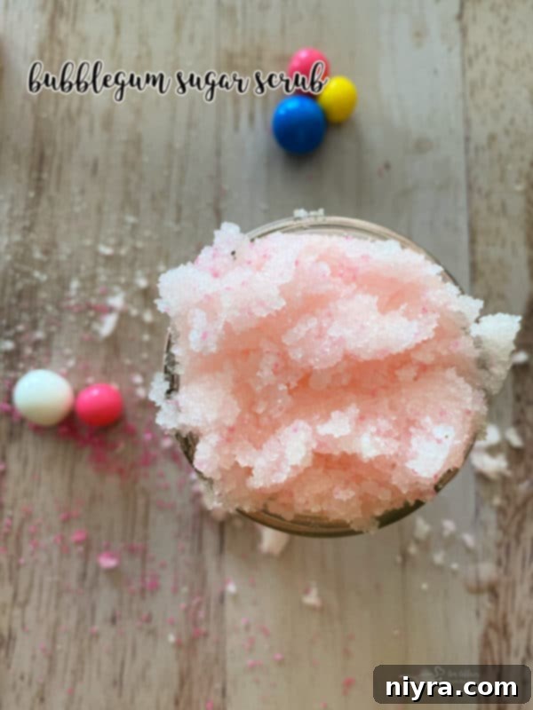 Bubblegum sugar scrub jar with a pink bow and tag.