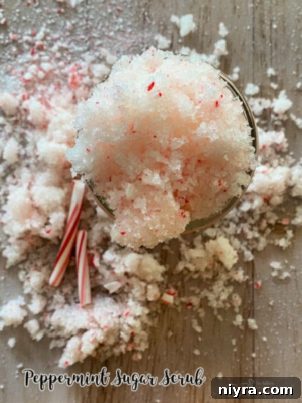 Peppermint sugar scrub jar decorated with a candy cane.