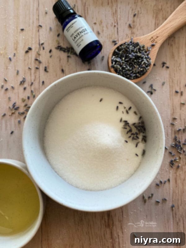 Close-up of lavender sugar scrub with dried lavender pieces.