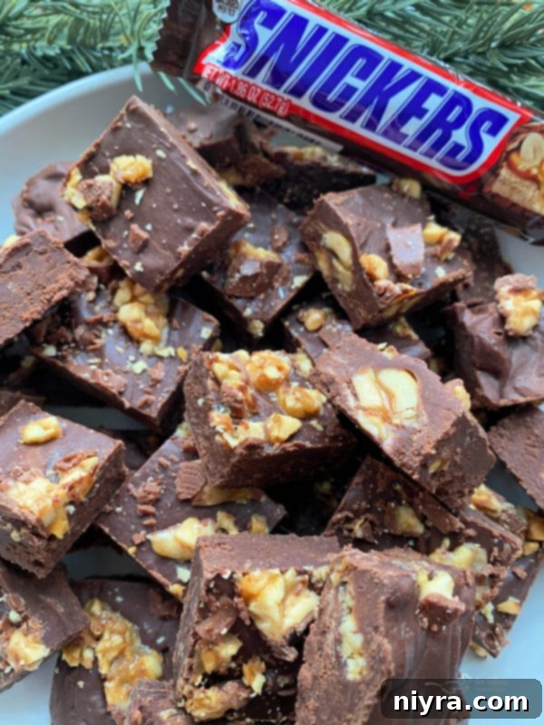 Bowl of Snickers Fudge, ready to be poured