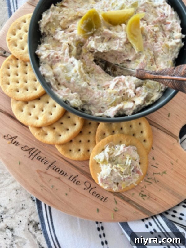 Close-up of Dilled Brussels Sprouts Dip with a spoonful missing