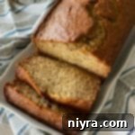 Unforgettable Banana Bread 10 overhead of The BEST Banana Bread on a white platter
